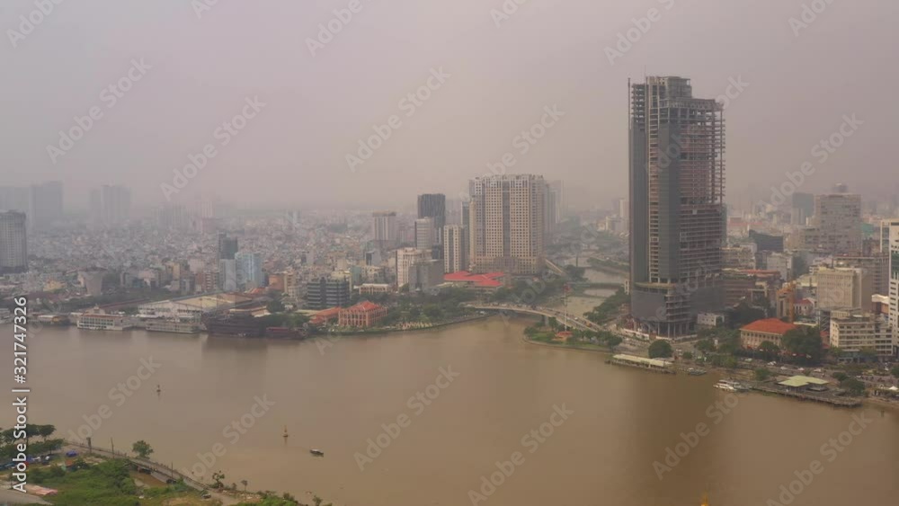 Aerial Vietnam Ho Chi Minh City Waterfront Downtown September 2019 Hazy Overcast Day 4K Mavic Pro Aerial video of downtown Ho Chi Minh City in Vietnam on a cloudy hazy overcast day. Aerial Vietnam Ho Chi Minh City Waterfront Downtown September 2019 Hazy Overcast Day 4K Mavic Pro Aerial video of downtown Ho Chi Minh City in Vietnam on a cloudy hazy overcast day.