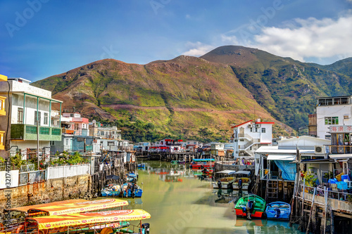 фотографія Homes and shops on stilts along the shores of Tai O fishing village on Lantau Island in Hong Kong