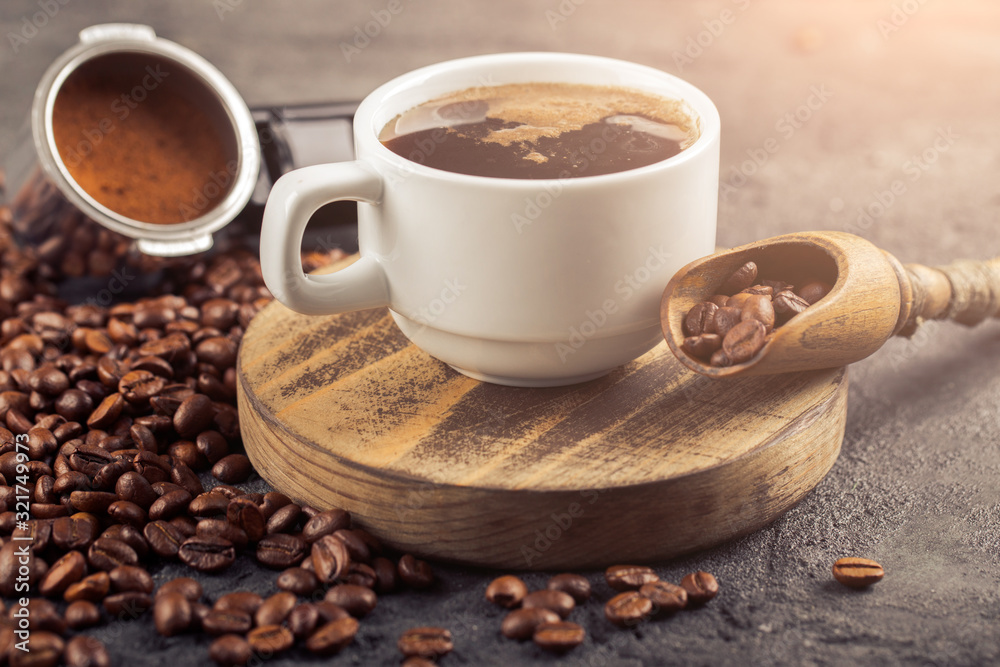 Ground coffee and coffee beans on old cafe table. Ground coffee and coffee beans on old cafe table.