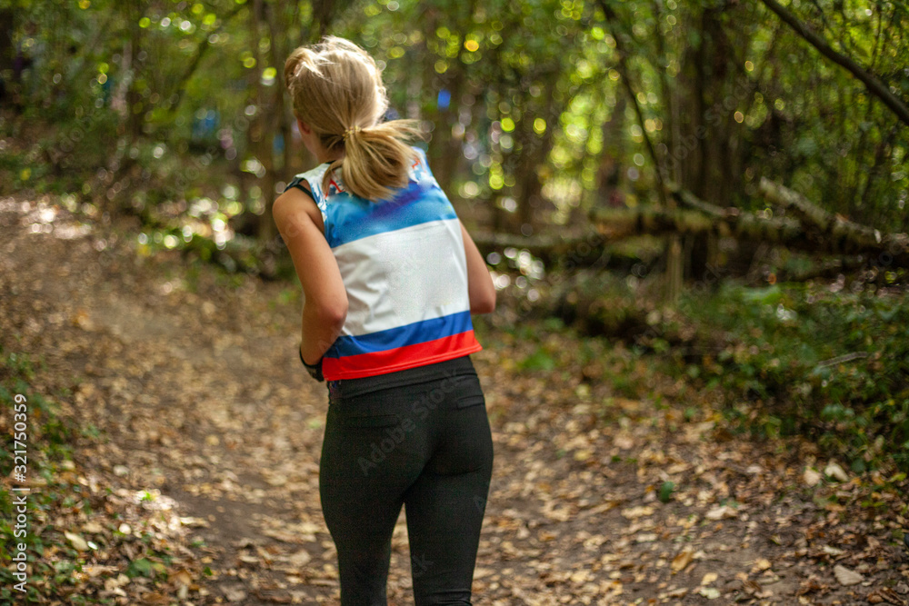 Sports running competition among children. Cross country running. Healthy lifestyle. Morning jog in the park. Exercise on the muscles and heart. Sports running competition among children. Cross country running. Healthy lifestyle. Morning jog in the park. Exercise on the muscles and heart.