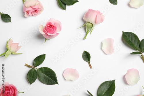 Fototapeta Naklejka Na Ścianę i Meble -  Composition with beautiful flowers on white background, top view. Floral card design