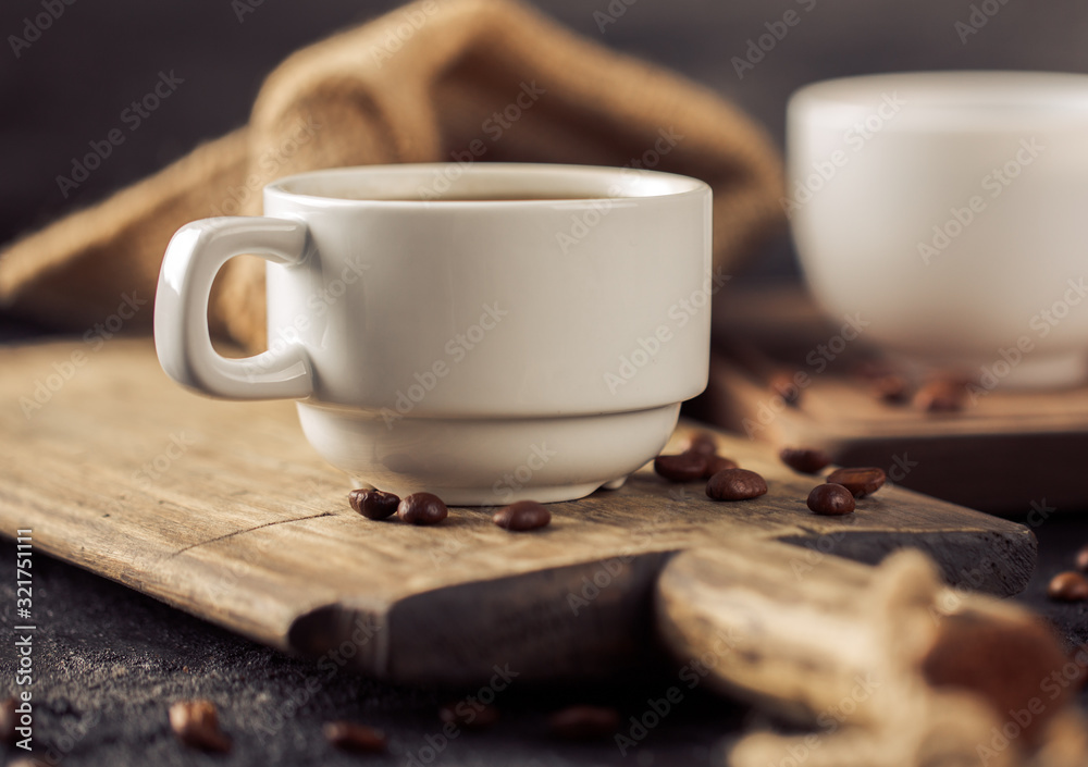 Ground coffee and coffee beans on old cafe table. Ground coffee and coffee beans on old cafe table.