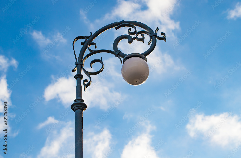 Street lamp against the blue sky Street lamp against the blue sky