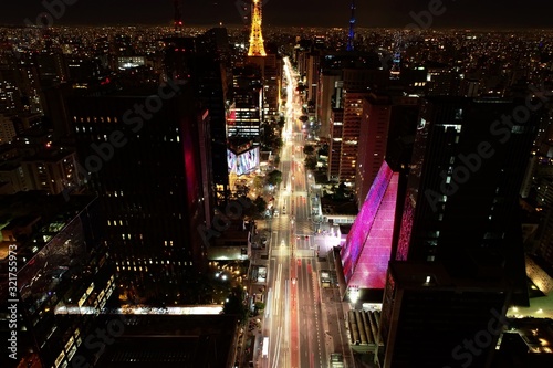 Panoramic view of a illuminated avenue em São Paulo, Brazil. Paulista Avenue. Great landscape. Colorful scenery. photo