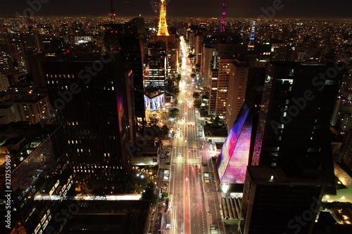 Panoramic view of a illuminated avenue em São Paulo, Brazil. Paulista Avenue. Great landscape. Colorful scenery. photo