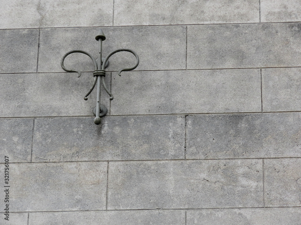 Cement wall with details of twisted iron crafts Cement wall with details of twisted iron crafts