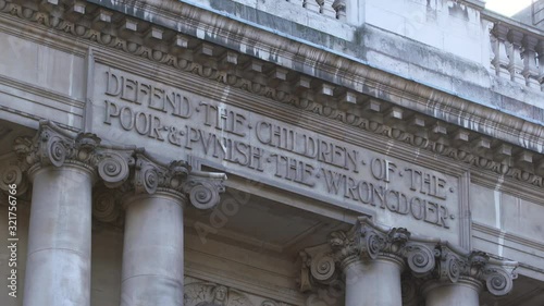 Close up of the inscription over the door of the Old Bailey