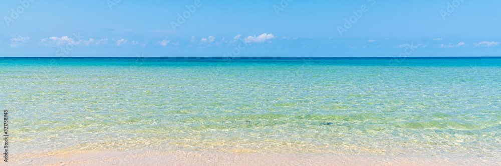 tropical beach and sea with blue sky, summer travel and vacation concept, background
