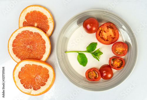 citrus fruits on white background
