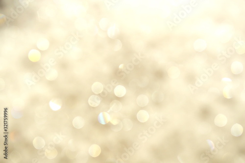 The abstract bokeh of a dishwashing liquid sponge that reflects in the sunlight.