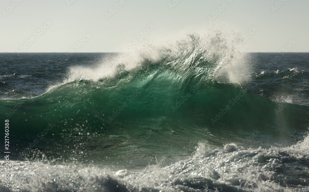 Fototapeta premium Huge waves at sunrise, Byron Bay Australia