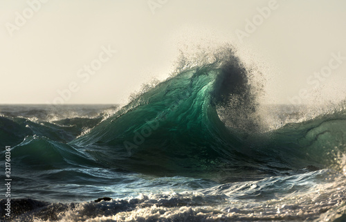 Fototapeta Naklejka Na Ścianę i Meble -  Huge waves at sunrise, Byron Bay Australia