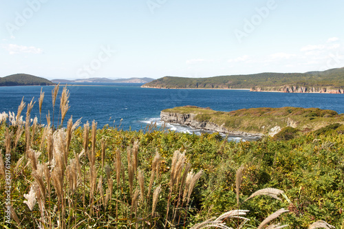 View from Cape Tobizin on the southern coast of the Russian island in Vladivostok on a sunny summer day. photo