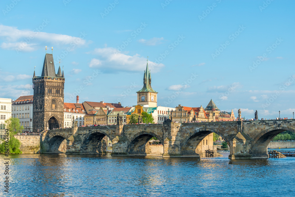 Scenic view of the Old Town pier architecture and Charles Bridge over Vltava river in Prague, Czech Republic