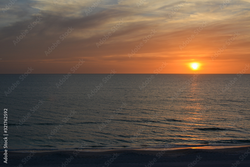 Sunset over the Gulf of Mexico as seen from Florida's tropical Longboat Key beach Sunset over the Gulf of Mexico as seen from Florida's tropical Longboat Key beach