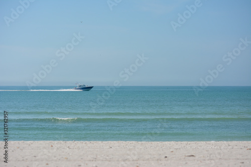 Boat cruising along the gulf coast of Florida near Sarasota
