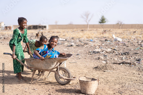 Canvastavla Real African ethnicity Juvenile Engaged with freshwater in a typical village