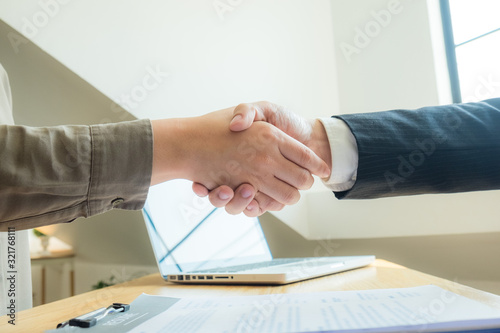 Bild auf Leinwand Successful Handshake in Presenting Resume for Work in the Company