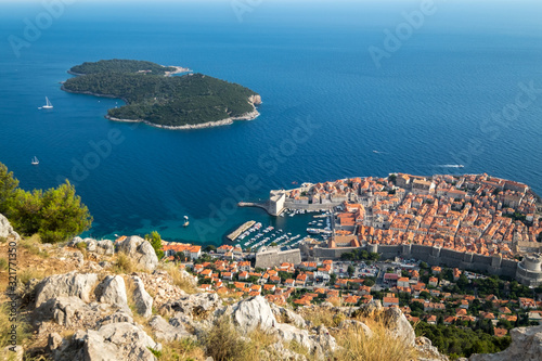 Aerial view of old city Dubrovnik in a beautiful summer day with blue sky
