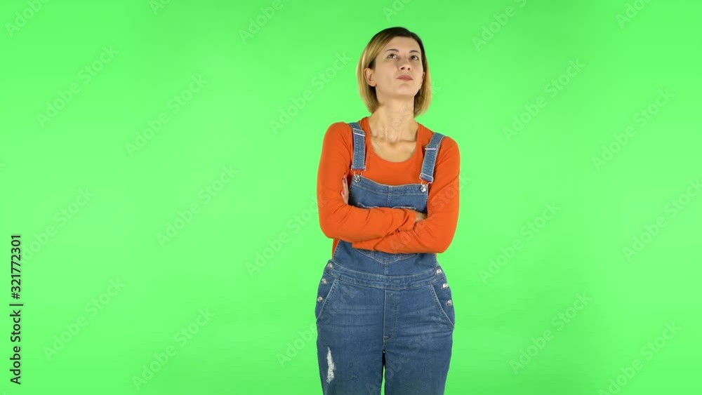 Lovely girl is very offended and looks away. Green screen Lovely girl is very offended and looks away. Green screen