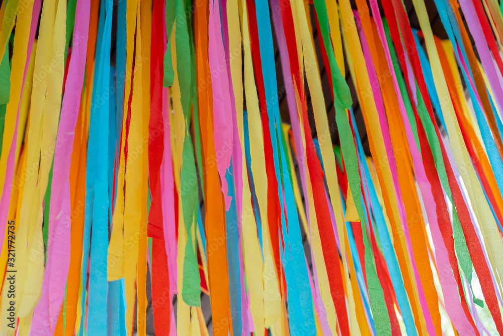 The colorful ribbon is hanging down from above. The colorful ribbon is hanging down from above.