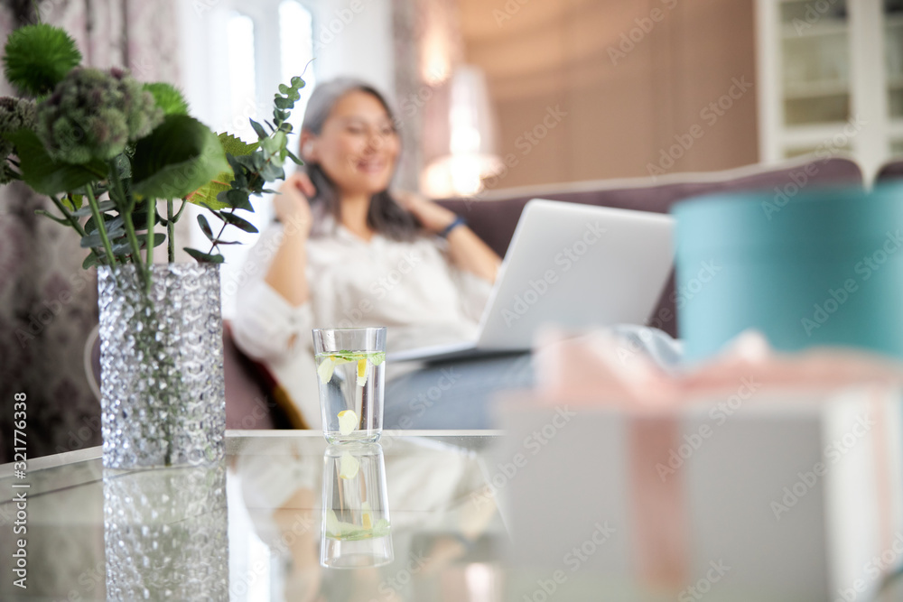 Beautiful flowers in vase on the table at home stock photo Beautiful flowers in vase on the table at home stock photo