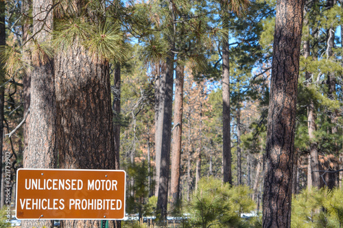 Unlicensed Motor Vehicles Prohibited Sign, at Tall Timbers County Park in Navajo County, Arizona USA photo