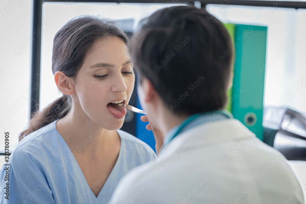 A doctor take care of sick patient woman at the hospital or medical clinic. A doctor take care of sick patient woman at the hospital or medical clinic.