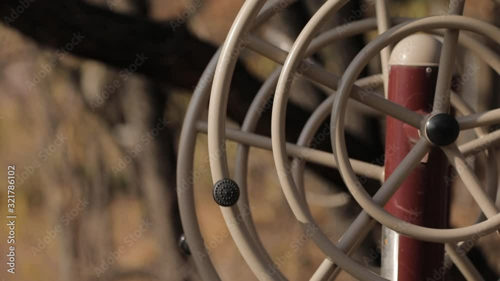 two metal wheels spin in the opposite direction two metal wheels spin in the opposite direction