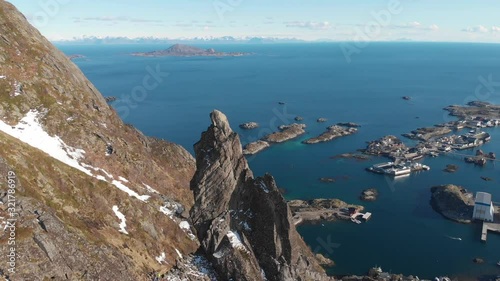 Amazing view rock climbing Svolvaergeita, Lofoten Islands. Norway. photo