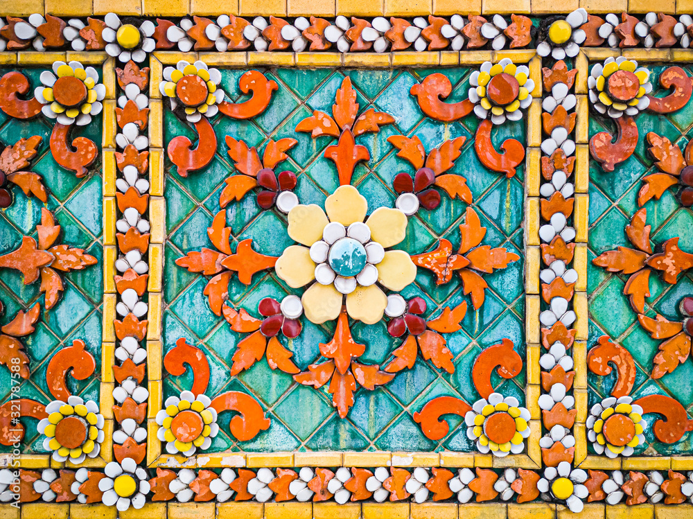Сeramic and glass mosaic decorating the building.