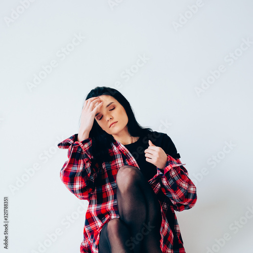 Young adult woman posing. Casual outfit. photo