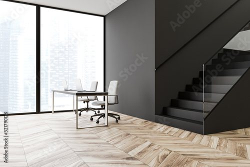 Gray panoramic office with stairs