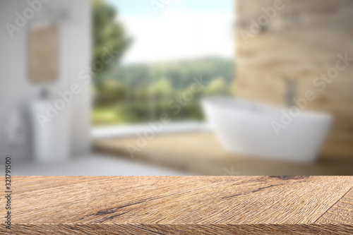 3D Render artwork of empty oak table top (desk) for product display with blurred bathroom interior background