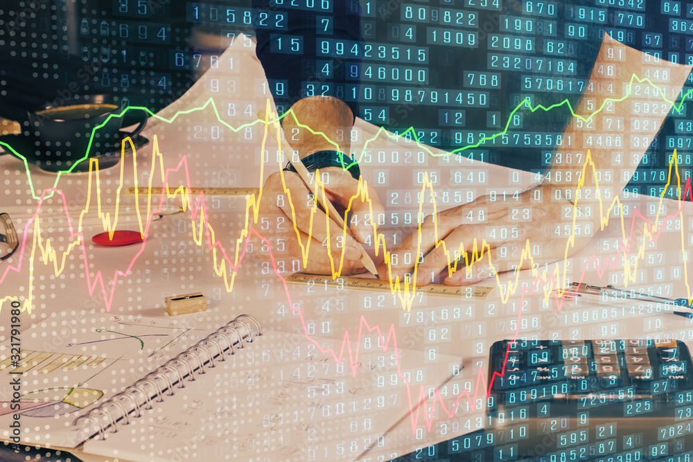 Double exposure of man writing on paper with forex graph. Double exposure of man writing on paper with forex graph.