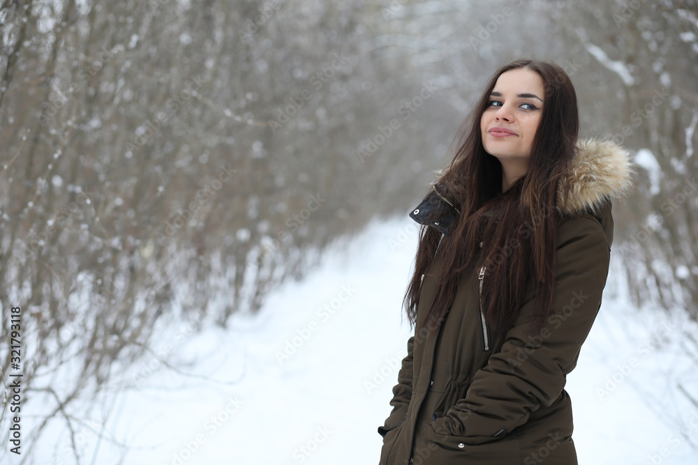 Beautiful girl in a beautiful winter park Beautiful girl in a beautiful winter park