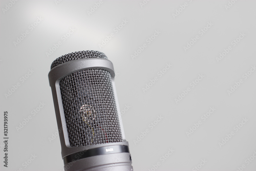 microphone on a gray background microphone on a gray background