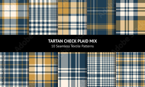 Tartan plaid pattern background set. Seamless check plaid graphic in blue, gold, and off white for scarf, flannel shirt, blanket, throw, duvet cover, or other autumn winter textile design. photo