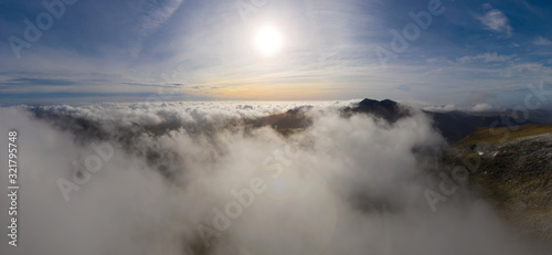 Snowdonia mountain range in Wales, winter panoramic view with cloud inversion