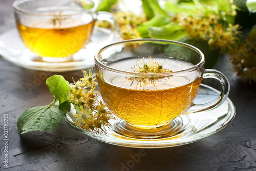 Linden herbal tea in glass cup. Аlternative medicine сoncept