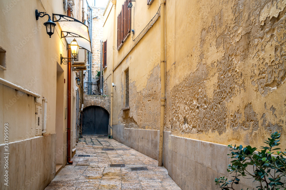 View of a narrow street in the Italian city Bari.