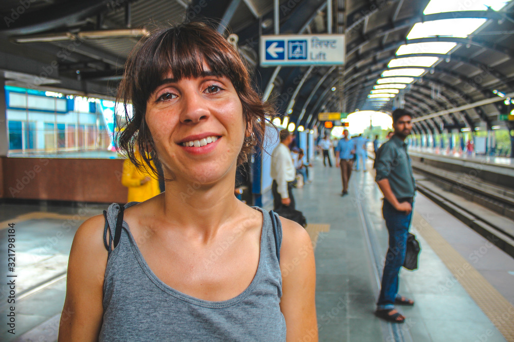 Delhi, India »; August 2016: A young woman using the internal train of the city of New Delhi Delhi, India »; August 2016: A young woman using the internal train of the city of New Delhi