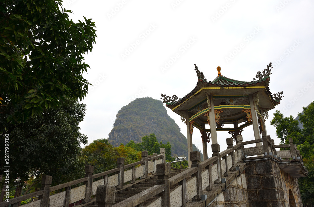 Stairs and a Traditional Construction in one of the Hills of Yangshuo, Guangxi Stairs and a Traditional Construction in one of the Hills of Yangshuo, Guangxi