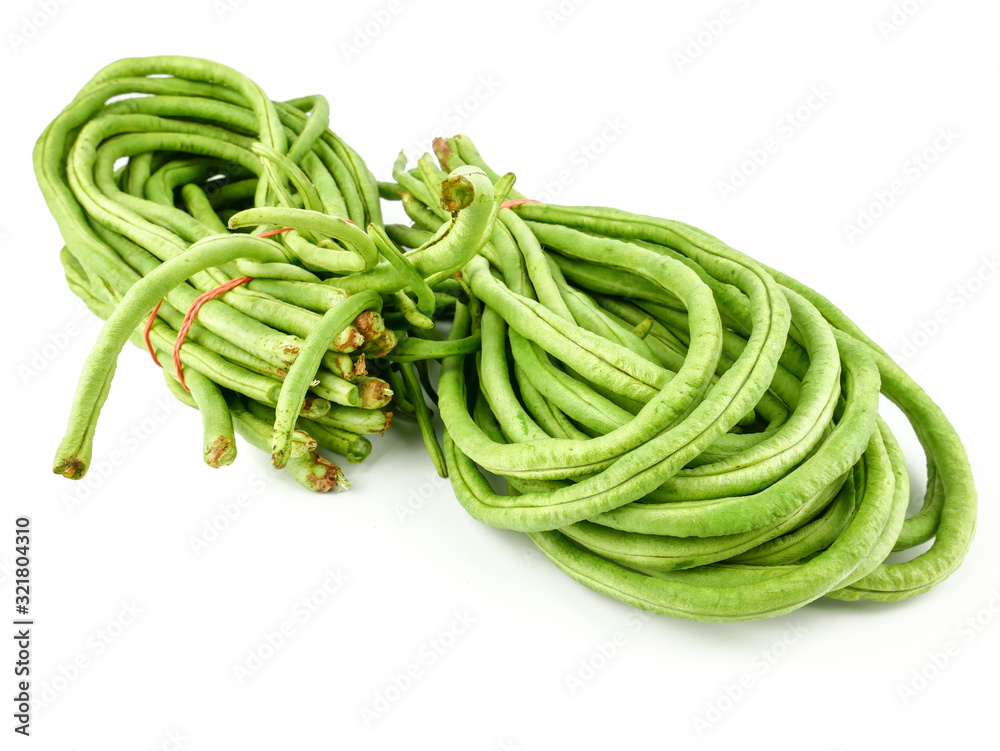 fresh Yard long beans or Chinese Long Beans (Vigna unguiculata subsp. sesquipedalis) isolated on a white background.Vegetables fresh Yard long beans or Chinese Long Beans (Vigna unguiculata subsp. sesquipedalis) isolated on a white background.Vegetables