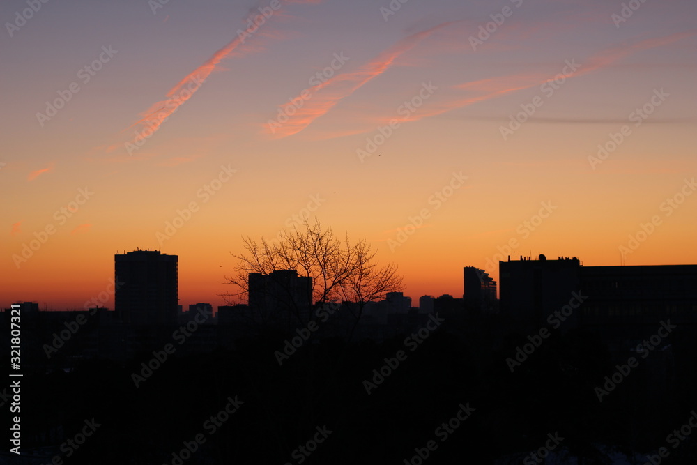the beginning of dawn over the city