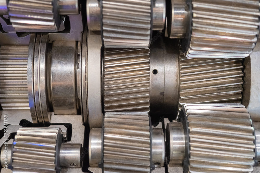 Aluminum parts. Background from steel parts. production of small aluminum products. Industrial background. Heavy industry. Pattern of gears. Development of industrial equipment. Machine parts Aluminum parts. Background from steel parts. production of small aluminum products. Industrial background. Heavy industry. Pattern of gears. Development of industrial equipment. Machine parts
