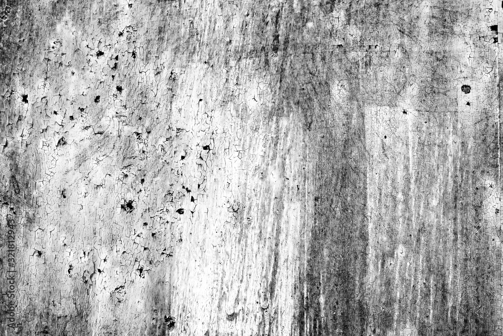 Texture of a metal wall with cracks and scratches which can be used as a background