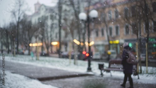Wallpaper Mural Beautiful winter snowy weather in streets of small town. Shallow depth of field, focus in foreground at white fluffy snowflakes. Torontodigital.ca