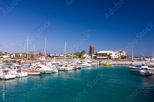 Marina with lighthouse,  Caleta de Fuste, Fuerteventura, Canary Islands, Spain, Europe