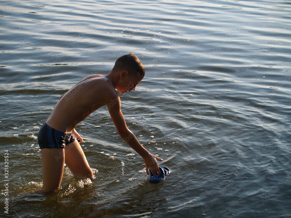Fototapeta premium children bathe in the river